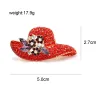 Broche chapeau cristal rouge