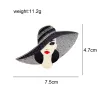 Dame au chapeau noir - broche