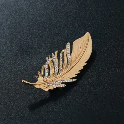 Broche plume dorée - avec cristaux