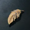 Broche plume dorée - avec cristaux