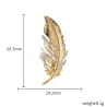 Broche plume dorée - avec cristaux