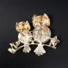 Broche double chouette - opale / cristaux