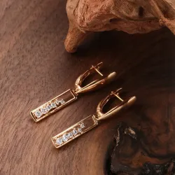 Boucles d'oreilles longues élégantes - or rose / cristaux