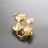 Chat double avec couronne - broche