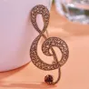 Grande note de musique en cristal - broche vintage