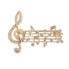 Broche notes de musique en cristal