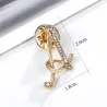 Lettres en cristal anglais - alphabet - broche dorée