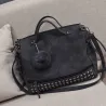 Vintage nubuck leather bag with rivets / fur pom pomBags