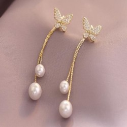 Boucles d'oreilles longues dorées - papillon / perles