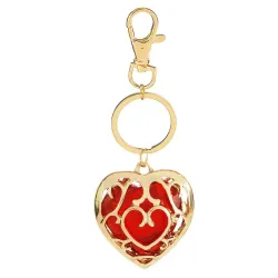 Coeur en cristal dans cage dorée - porte-clés