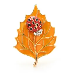Broche avec scarabée et feuille