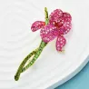 Fleur d'orchidée en cristal - broche élégante