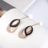 Boucles d'oreilles longues or rose - triple cercles ovales