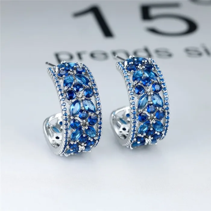 Boucles d'oreilles élégantes en argent - fleurs de cristal