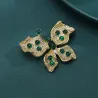 Broche en forme de papillon avec cristaux