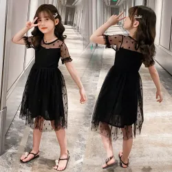 Élégante robe en mousseline noire à pois