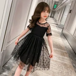 Elegant black chiffon dress with dotsClothing