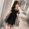 Elegant black chiffon dress with dotsClothing