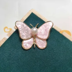 Papillon coquillage avec perle - broche