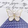 Papillon coquillage blanc - avec une perle - broche