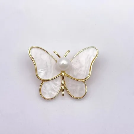 Papillon coquillage blanc - avec une perle - broche