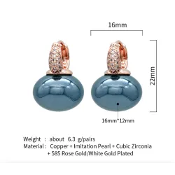 Boucles d'oreilles élégantes avec une perle / cristaux