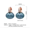 Boucles d'oreilles élégantes avec une perle / cristaux