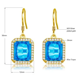 Boucles d'oreilles dorées avec topaze cristal bleu / strass