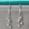 Boucles d'oreilles longues en argent - chaînes avec perles