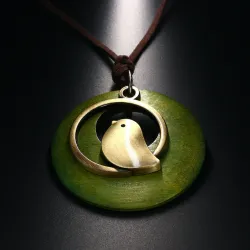 Wooden pendant with bird - rope necklaceNecklaces