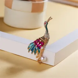 Crystal crane with pearl - broochBrooches