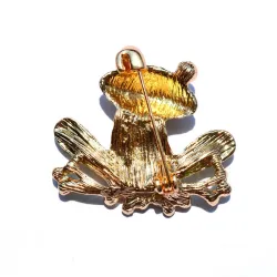 Grenouille en cristal coloré - broche dorée