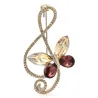 Note de musique avec papillon - broche