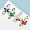 Note de musique avec papillon - broche