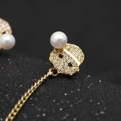 Boucles d'oreilles longues de Noël - avec cristaux - bonhomme de neige / chapeau / perle