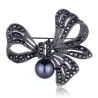 Broche fleur en cristal - avec perle noire