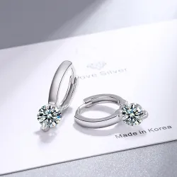 Petites boucles d'oreilles rondes avec cristaux blancs