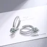 Petites boucles d'oreilles rondes avec cristaux blancs