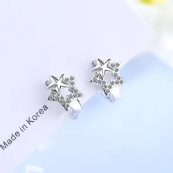 Boucles d'oreilles en argent avec une double étoile / cristaux