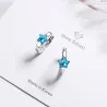 Boucles d'oreilles rondes en argent avec une étoile en cristal bleu