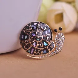 Broche escargot en cristal