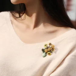 Vase avec tournesols - broche rétro