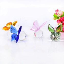 Papillon / boule en cristal coloré - figurine