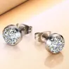 Petites boucles d'oreilles classiques - avec un cristal rond blanc