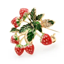 Élégante broche fraise en cristal avec feuilles