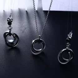 Boucles d'oreilles rondes en céramique noire & collier