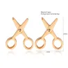 Petites boucles d'oreilles de ciseaux