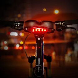 Selle de vélo avec éclairage d'avertissement