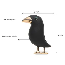 Broche élégante avec corbeaux noirs