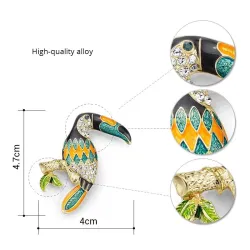 Broche élégante avec oiseau toucan cristallin